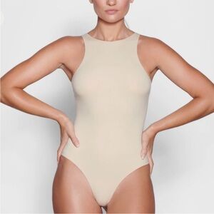 Skims High Neck Bodysuit in Clay